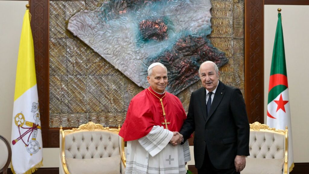 Pope Leo XIV shakes hands with Algerian President Abdelmadjid Tebboune at the Presidential Palace in Algiers, Monday, April 13, 2026. | Credit: Vatican Media