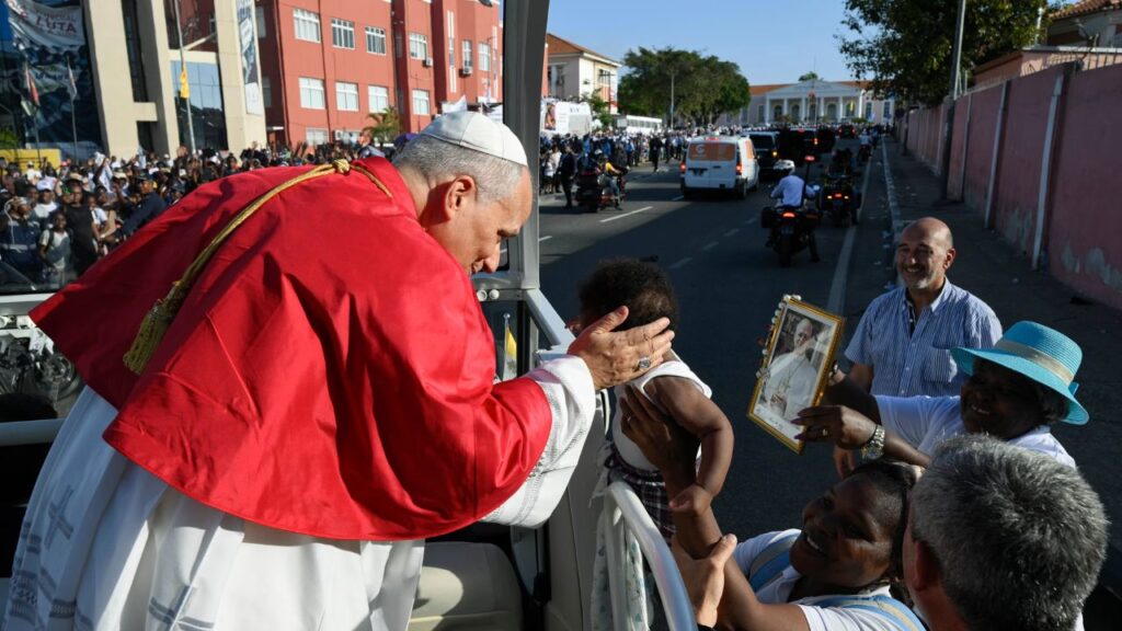 Pope Leo XIV greets a child in Luanda, Angola, Saturday, April 18, 2026. | Credit: Vatican Media