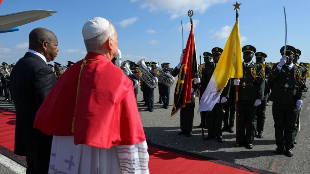 Pope Leo XIV receives a ceremonial greeting upon his arrival at Quatro de Fevereiro Airport in Luanda, Angola, Saturday, April 18, 2026. | Credit: Vatican Media