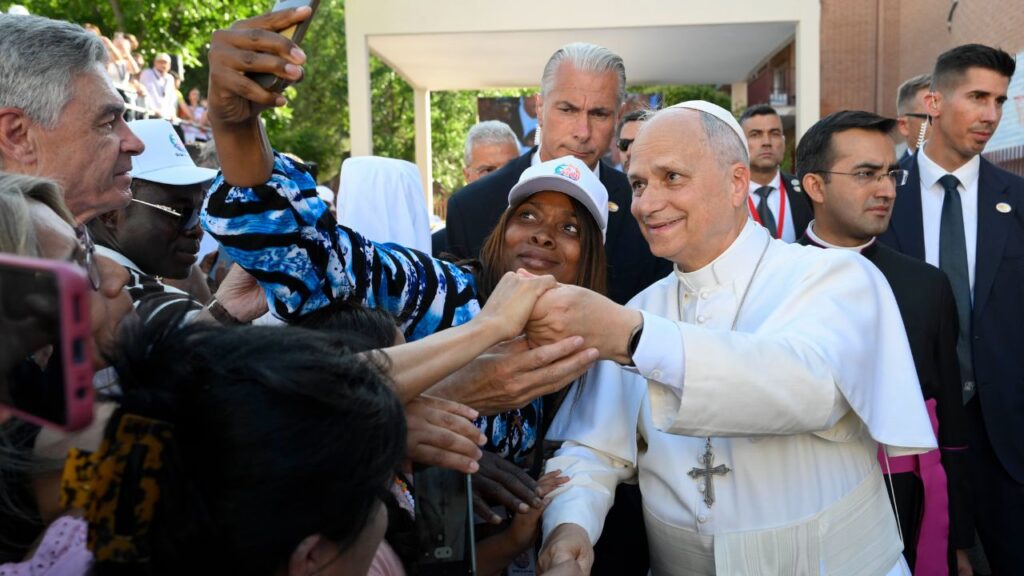 Pope Leo XIV pauses for a selfie after his meeting with staff and beneficiaries, including migrants, of the CEDIA 24 Horas center, part of the Caritas of the Archdiocese of Madrid in Spain on June 6, 2026. | Credit: Vatican Media 