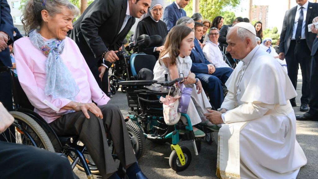 Pope Leo XIV greets a girl in a wheelchair during a meeting with a group of around 40 people with longterm illnesses or disabilities on June 6, 2026, at the nunciature in Madrid, Spain. | Credit: Vatican Media. 