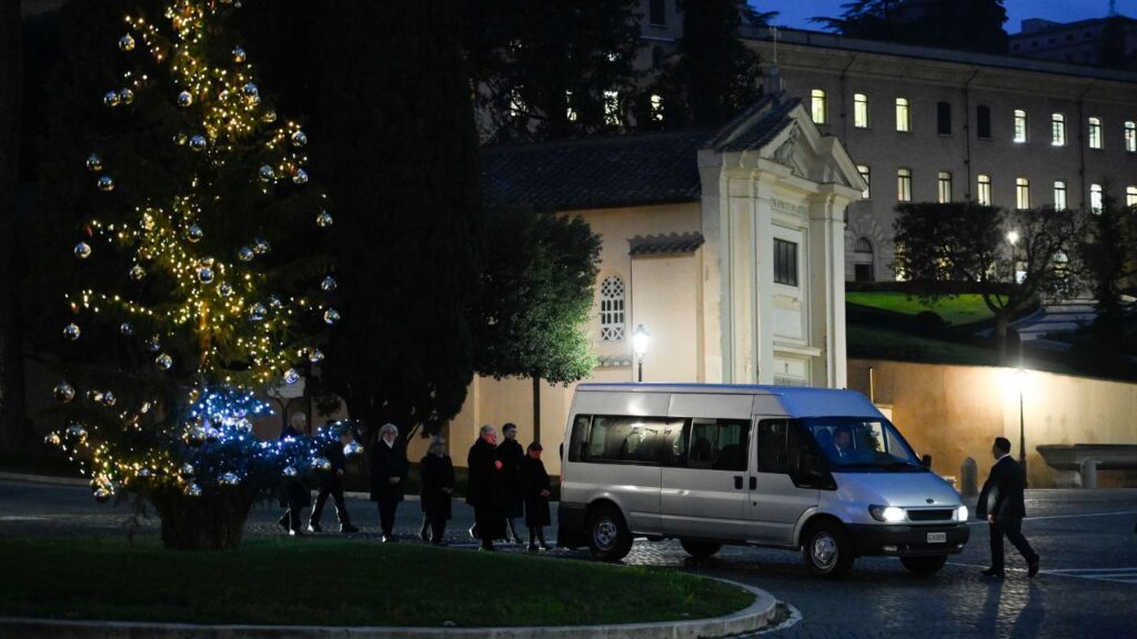 The mortal remains of Benedict XVI were moved early in the morning on Jan. 2, 2023, from his former residence in the Vatican's Mater Ecclesiae Monastery to St. Peter's Basilica, where the late pope is lying in state through Jan. 4. Thousands waited in line to pay their respects. | Vatican Media