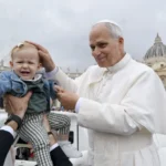 Pope Leo XIV greets a baby during his general audience in St. Peter’s Square at the Vatican on Wednesday, Oct. 22, 2025 | Credit: Vatican Media