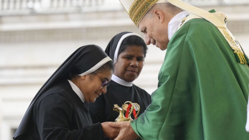 Two missionary nuns present the gifts to Pope Leo at the closing Mass for the Jubilee of Missions and Migrants. Credit: Vatican Media