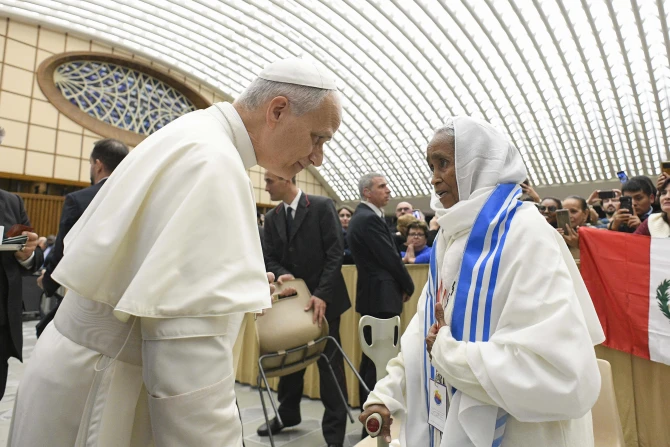 Pope Leo XIV meets with participants of the fifth World Meeting of Popular Movements on Oct. 23, 2025, in the Vatican’s Paul VI Audience Hall. | Credit: Vatican Media