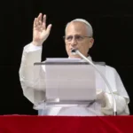 Pope Leo XIV waves to pilgrims gathered in St. Peter’s Square for his Sunday Angelus on Oct. 26, 2025, at the Vatican. | Credit: Vatican Media