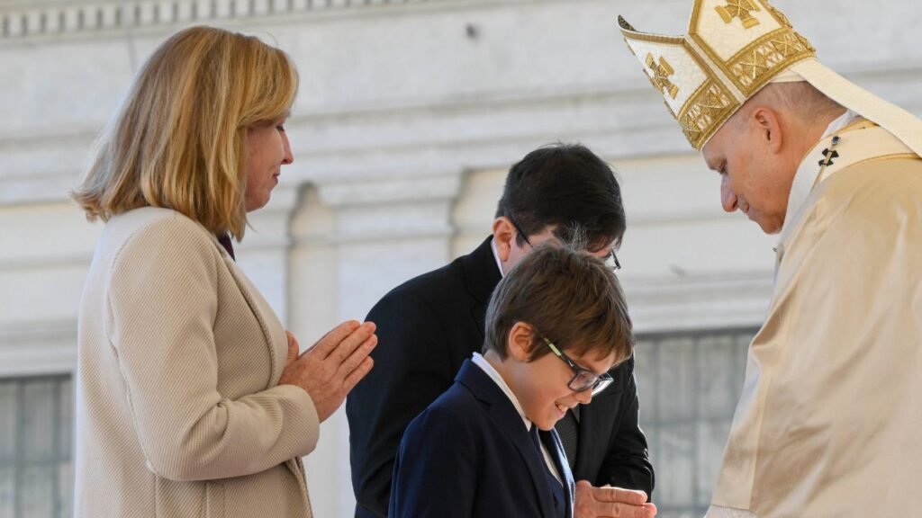 A family presents the gifts at the offertory for the Holy Mass during a Jubilee Mass. Credit: Vatican Media