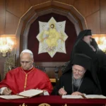 Pope Leo XIV and Ecumenical Patriarch Bartholomew I of Constantinople sign a joint declaration at the Palace of the Ecumenical Orthodox Patriarchate in Istanbul, Turkey, on November 29, 2025. | Vatican Media