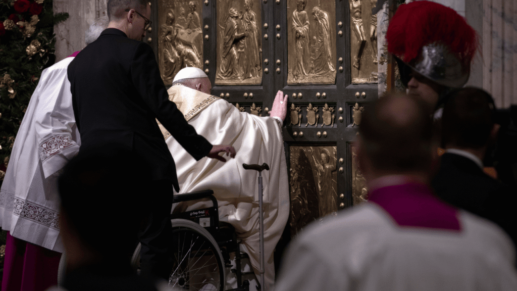 Pope Francis opens the Holy Door of St. Peter's Basilica. Credit: Vatican Media