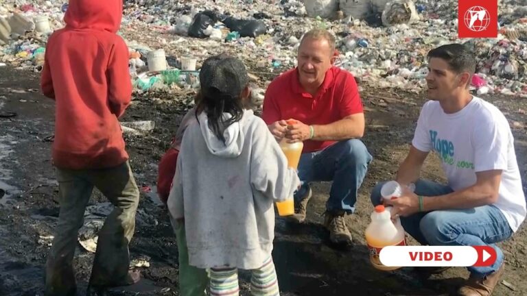 Craig Johring and Danny Leger with children in El Bordo's landfill. Credit: EWTN Vatican