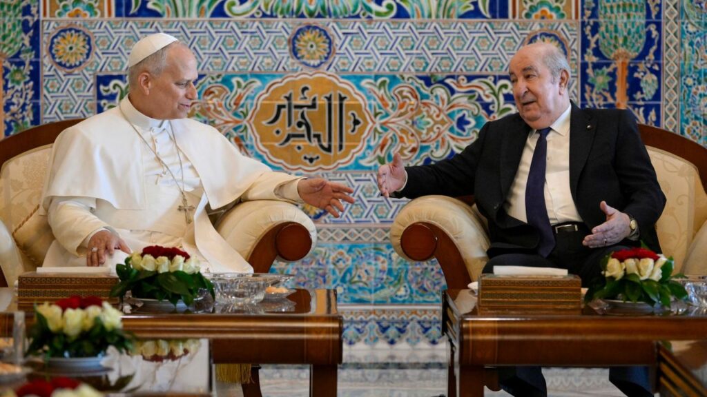 Pope Leo XIV speaks to Algerian President Abdelmadjid Tebboune at Houari Boumediene International Airport before departing Algeria, Wednesday, April 15, 2026. | Credit: Vatican Media