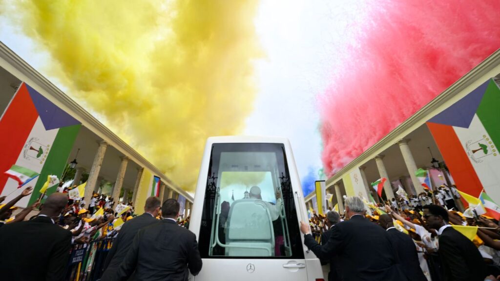 Colorful smoke drifts above Pope Leo XIV at the Basilica of the Immaculate Conception in Mengomeyén, Equatorial Guinea, Wednesday, April 22, 2026. | Credit: Vatican Media