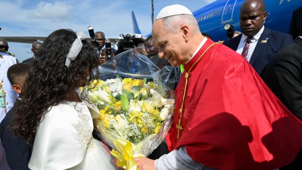 Pope Leo XIV is greeted by a young Catholic upon his arrival at Yaoundé-Nsimalen International Airport near Yaoundé, Cameroon, Wednesday, April 15, 2026. | Credit: Vatican Media