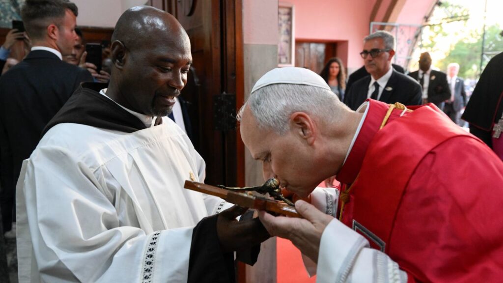 Pope Leo XIV venerates a crucifix during a meeting with bishops, priests, consecrated men and women, catechists, and other pastoral workers at the Parish of Our Lady of Fátima in Luanda, Angola, on April 20, 2026. | Credit: Vatican Media