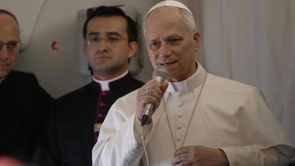 Pope Leo XIV speaks aboard the papal plane flying from Algeria to Cameroon on April 15, 2026. | Credit: Patrick Leonard/EWTN News