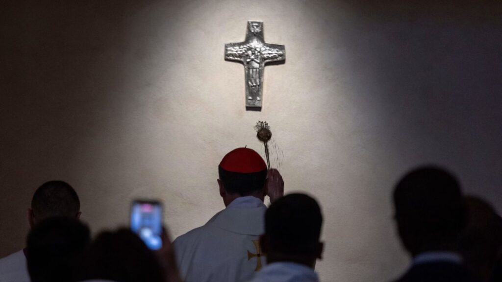Cardinal Rolandas Makrickas, archpriest of the Basilica of St. Mary Major, sprinkles holy water on the tomb of Pope Francis at the aforementioned basilica in Rome on April 21, 2026. | Credit: Daniel Ibanez/EWTN News