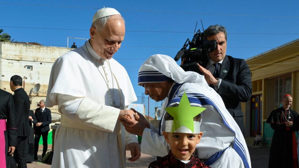 A religious sister greets Pope Leo XIV at the Notre Dame d’Afrique Kindergarten, run by the Missionary Sisters of Charity, near Algiers, Wednesday, April 15, 2026. | Credit: Vatican Media