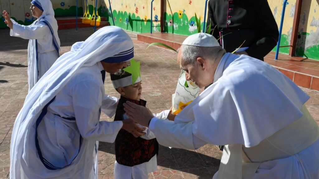 Pope Leo XIV greets a child at the Notre Dame d’Afrique Kindergarten, run by the Missionary Sisters of Charity, near Algiers, Wednesday, April 15, 2026. | Credit: Vatican Media