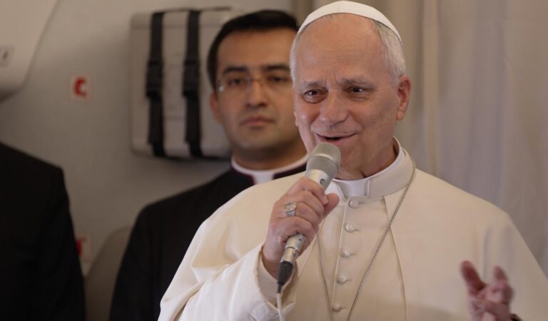 Pope Leo XIV speaks to reporters on the papal flight to Equatorial Guinea on April 21, 2026. | Credit: Patrick Leonard/EWTN News