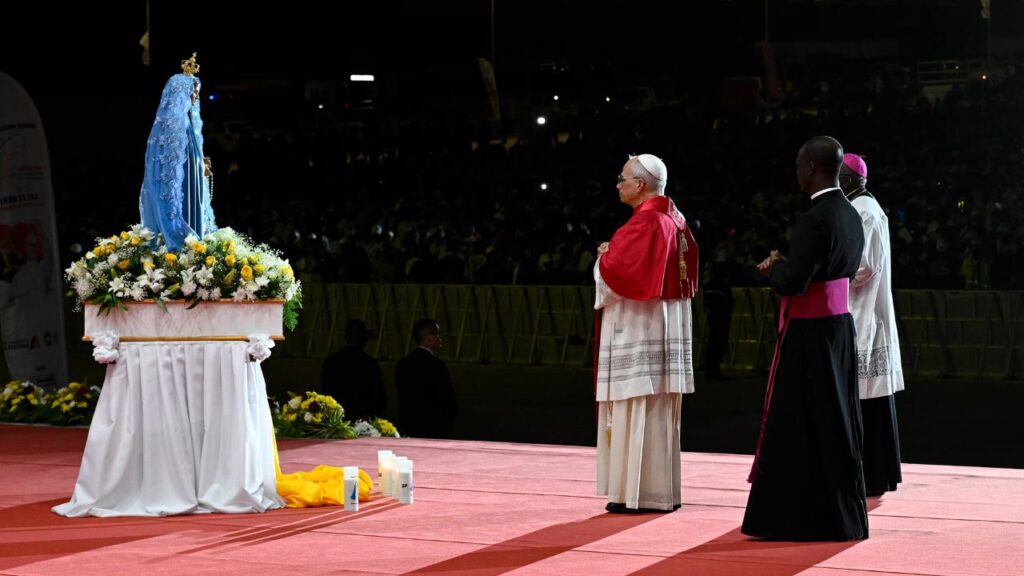 Pope Leo XIV venerates an image of Mary before leading the faithful in the rosary at the Marian shrine of Mama Muxima in Kimbaxe, Angola, on April 19, 2026. | Credit: Vatican Media