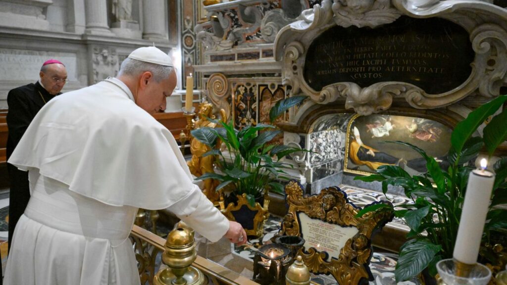 Pope Leo XIV lights a candle at the tomb of St. Benedict of Nursia at the Abbey of Montecassino on July 20, 2026. | Credit: Vatican Media