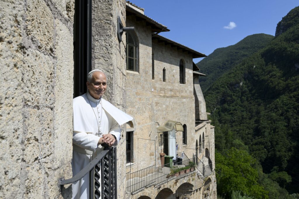 Pope Leo XIV stands out of a window at St. Benedict Abbey in Subiaco, Italy, on July 22, 2026. | Credit: Vatican Media
