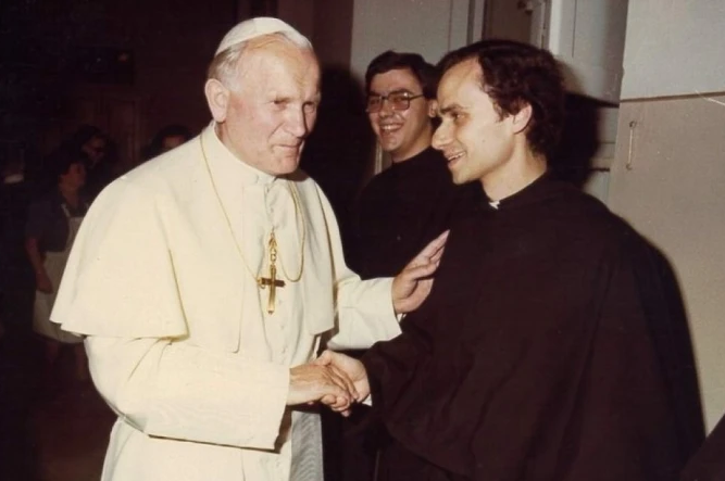St. John Paul II and a young Robert Francis Prevost, wearing the black habit of the Augustinians. | Credit: Photo courtesy of the Augustinian Midwest Province (USA) Our Mother of Good Counsel