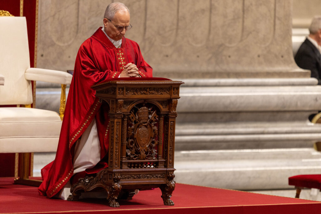 Pope Leo XIV prays in St. Peter’s Basilica during the Liturgy of the Lord’s Passion, Friday, April 3, 2026. | Credit: Daniel Ibáñez/EWTN News