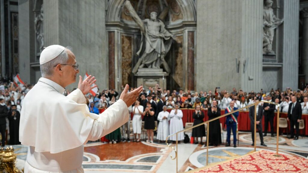 Pope Leo XIV greets the people at his general audience in St. Peter’s Basilica on Aug. 19, 2026. The general audience is being held in the basilica in August to avoid the hot summer temperatures. | Credit: Vatican Media