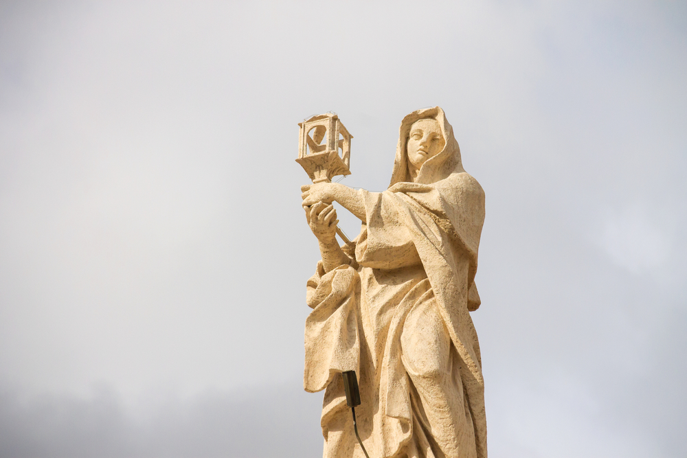 St. Clare of Assisi on the colonnade of saints at the Vatican. | Credit: Nick_Nick/Shutterstock