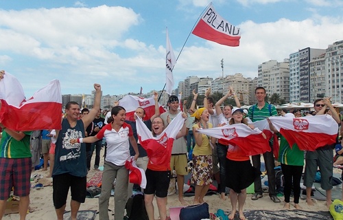 Polish pilgrims celebrate after hearing the news that the next World Youth Day will be hosted by Krakow, Poland in 2016. | Credit: Walter Sanchez Silva/EWTN News