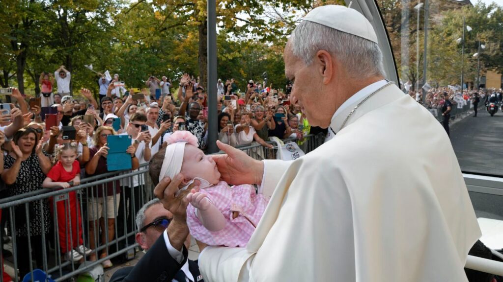 Pope Leo XIV stops to bless a baby as he makes his way to the Cathedral of St. Stephen on Sept. 28, 2026, in Metz, France. | Credit: Vatican Media