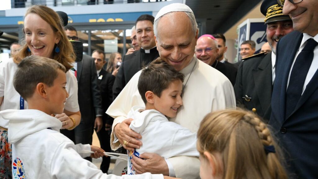 Pope Leo XIV embraces a child after landing in Metz, France, on Sept. 28, 2026. | Credit: Vatican Media
