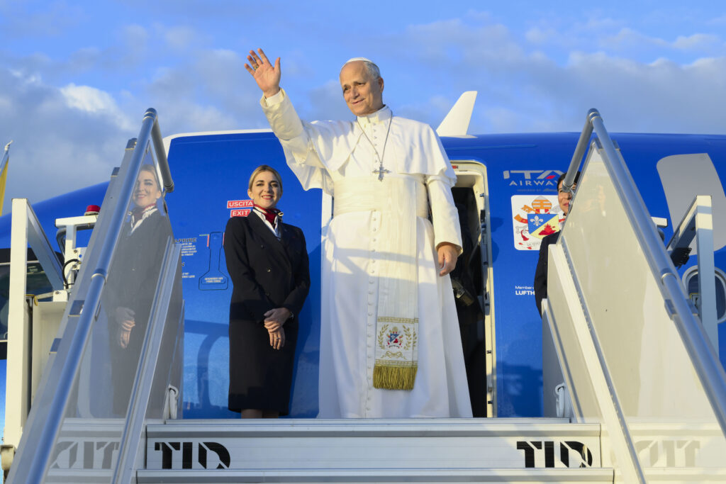 Pope Leo XIV waves as he boards the plane ITA Airways A321, as he departed Rome to begin his apostolic journey to France on Sept. 25, 2026. | Credit: Vatican Media