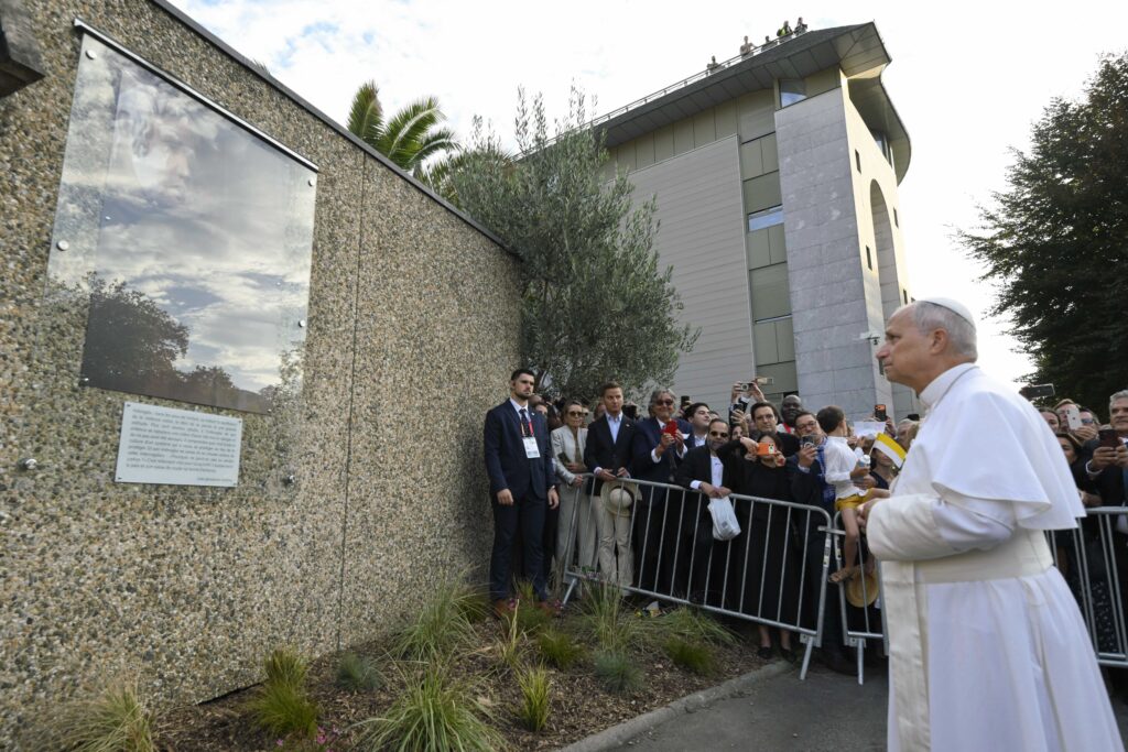 Pope Leo XIV looks at a memorial dedicated to victims of clerical sexual abuse in Lourdes, France, on Sept. 27, 2026. | Credit: Vatican Media