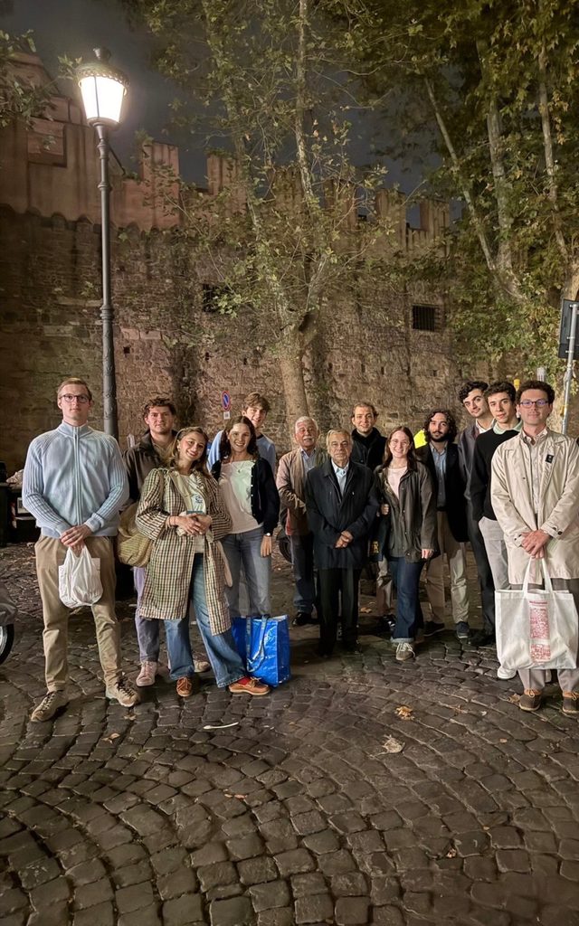 Youth volunteers, including Luigi Salvaggi (sixth from right), prepare to feed the homeless in St. Peter's Square on Oct. 6, 2026. | Credit: Isabella Reed/EWTN News